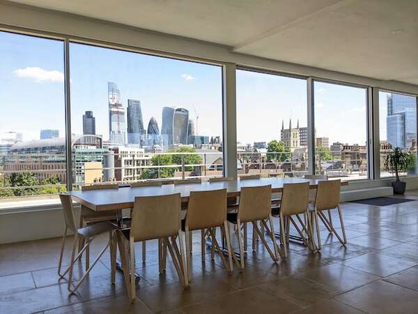 Meeting room at Menier Penthouse with an impressive view of London's city skyline